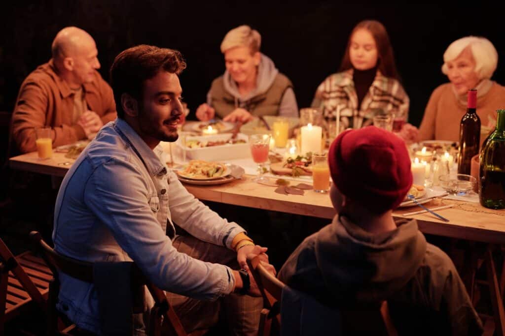 A family gathered together over a dinner party