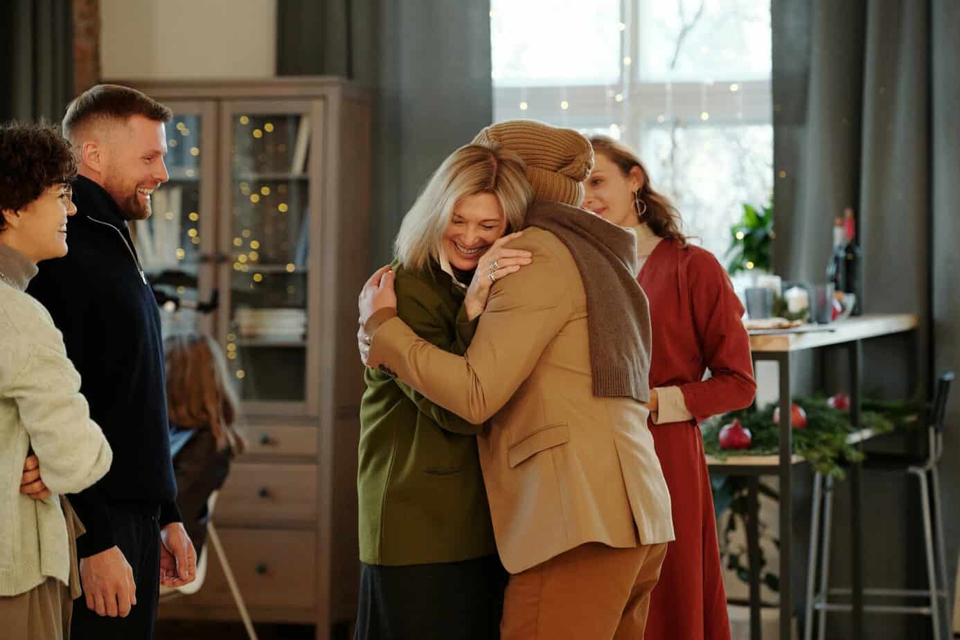 A Happy family getting together and hugging each other